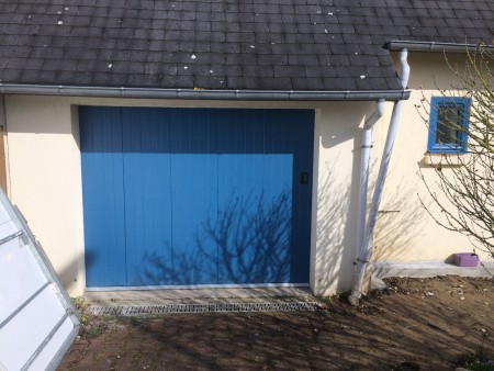 Porte de garage latérale coulissante en Aluminium isolé à Taden